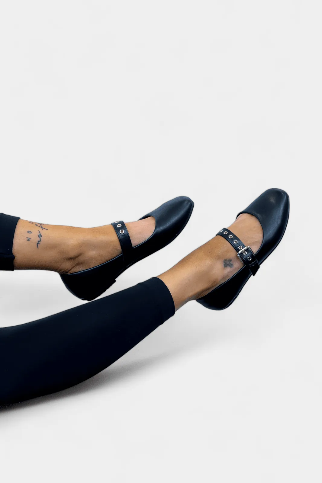 Black Grommet Ballet Flats